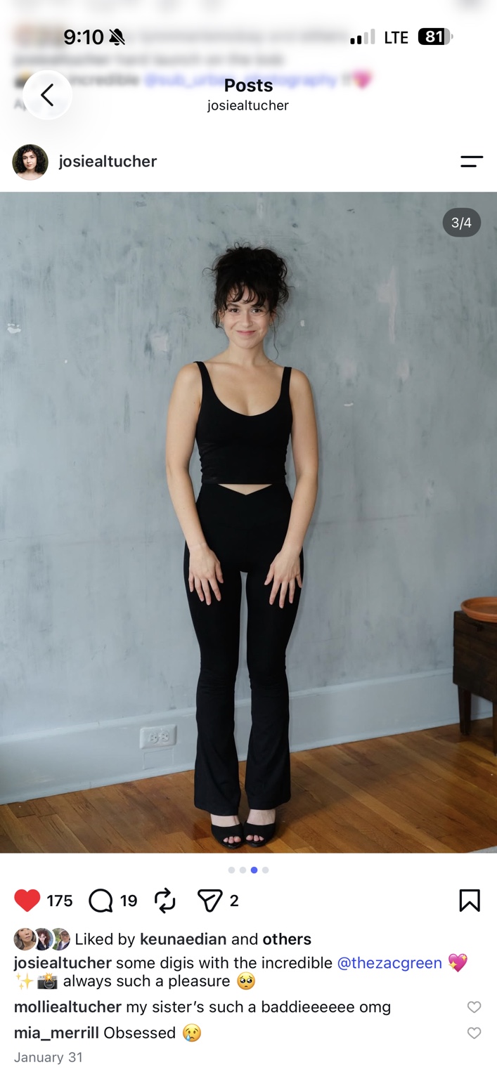 Full length smiling studio portrait of Josie Altucher in black